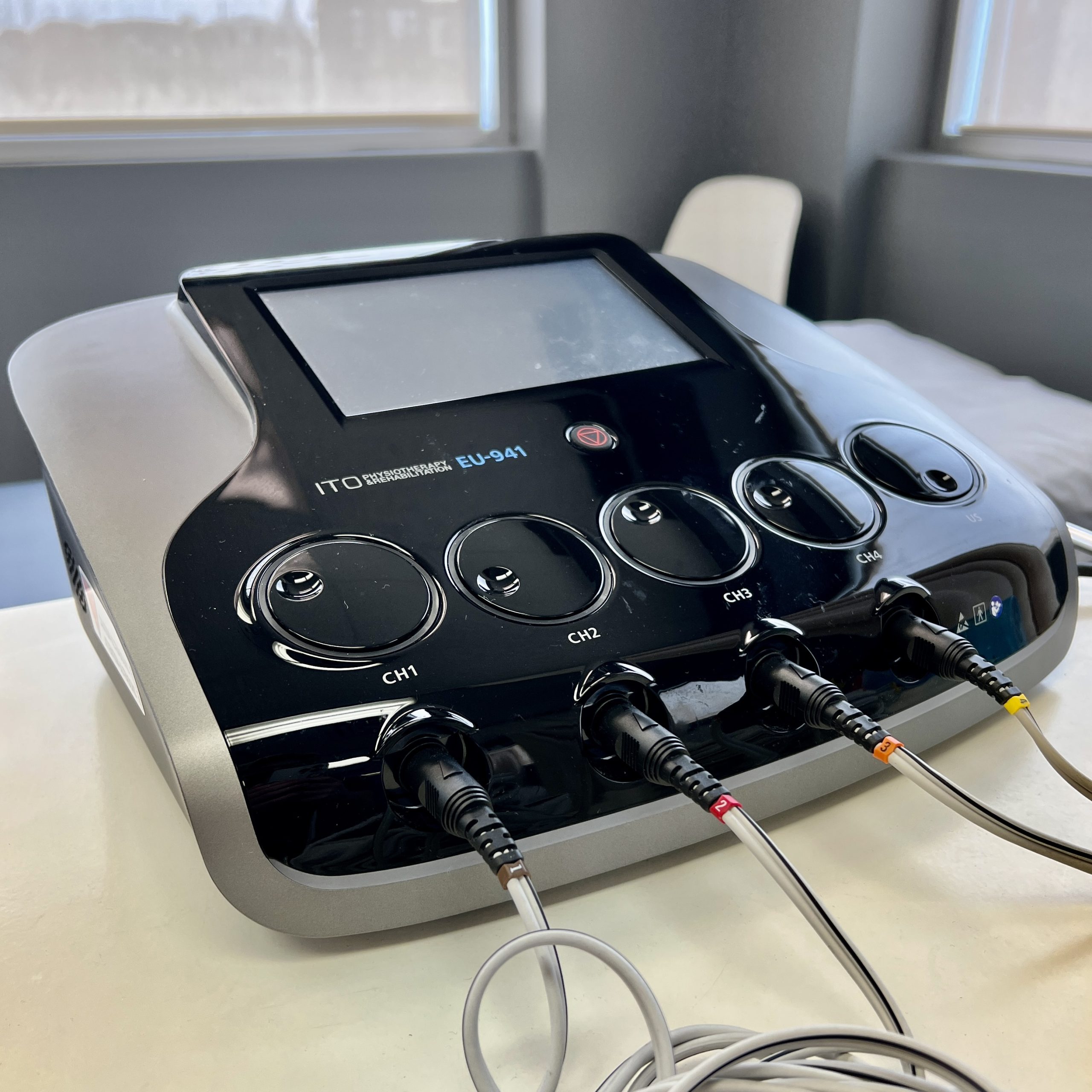 An image of the ITO EU-941, which is an ultrasound and electrotherapy combo, with 4 channels for the electrotherapy, used at the PhysioCore & Sports Rehab physiotherapy clinic.